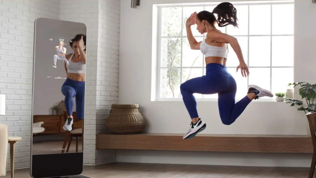 woman jumping using ProForm Vue mirror