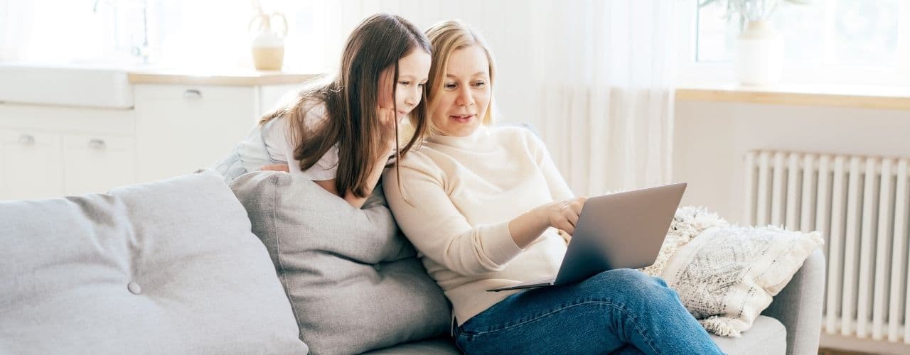 woman pointing at laptop