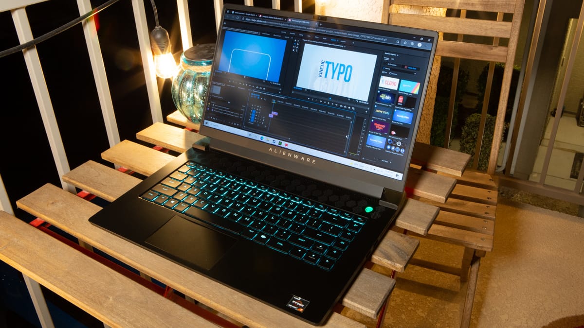 Alienware m15 Ryzen gaming laptop on a balcony table