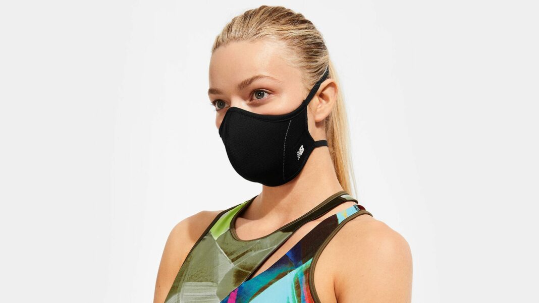 woman wearing New Balance active performance mask