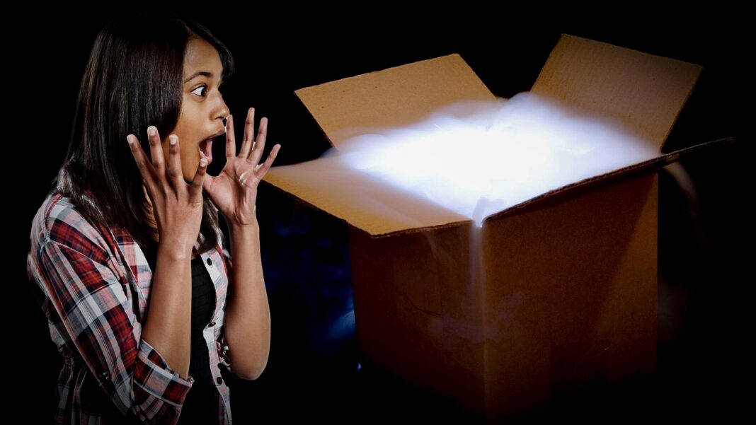 girl shocked at a mystery package