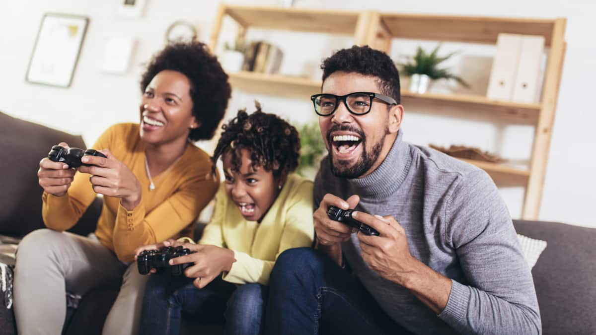 family playing video games together