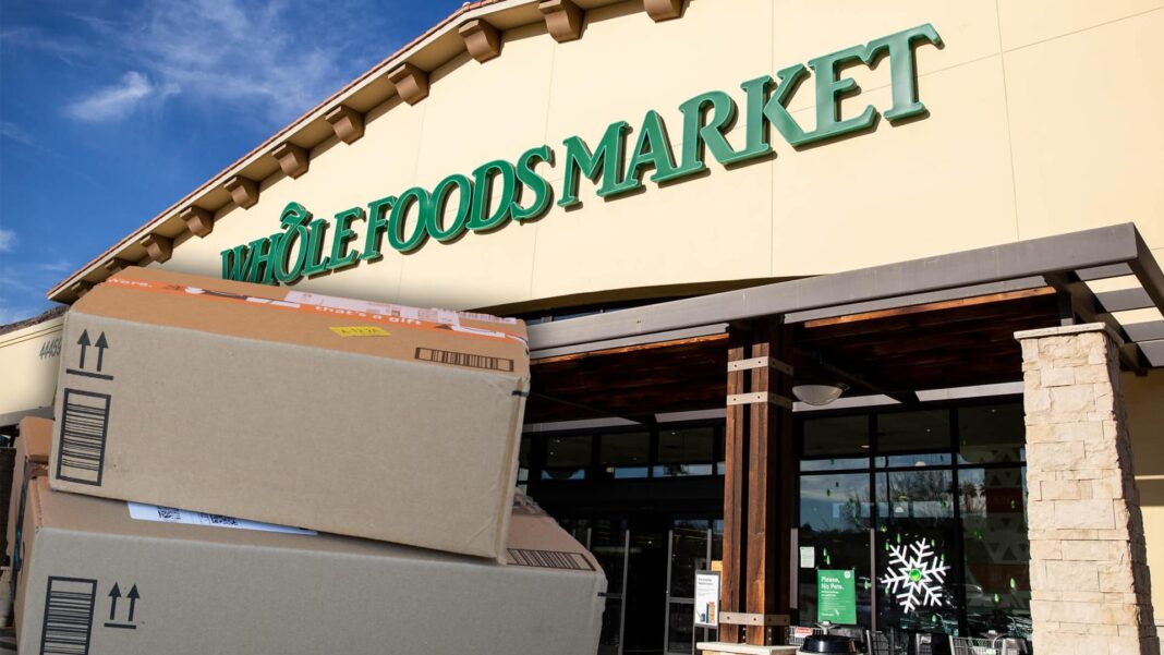 whole foods storefront exterior and amazon boxes for return