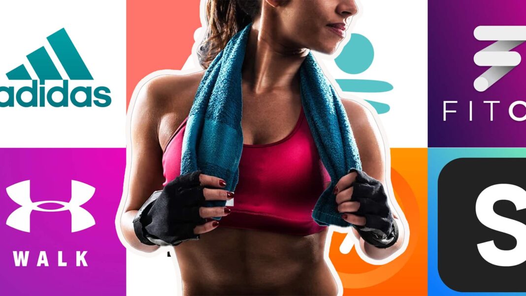 fitness apps and fit woman holding workout towel silo