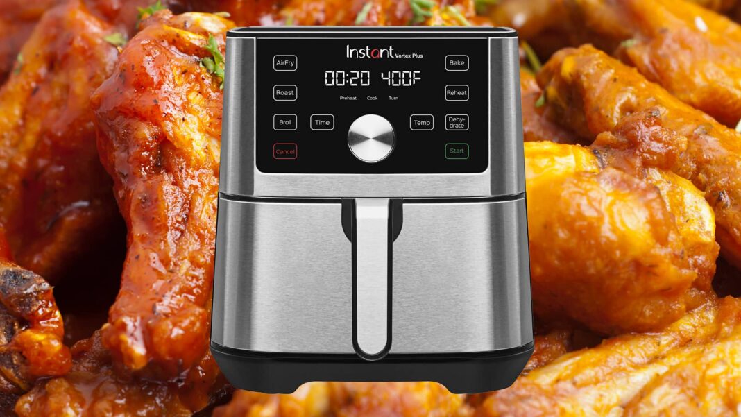 instant pot on background of chicken wings