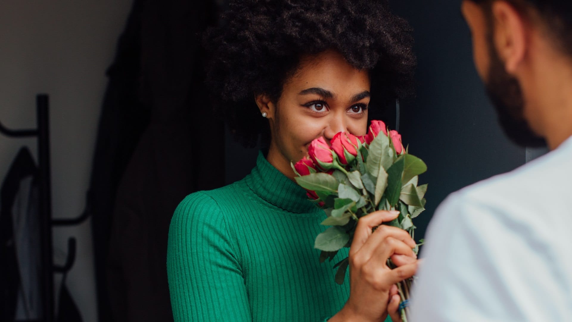 Woman with roses as Valentine's gift