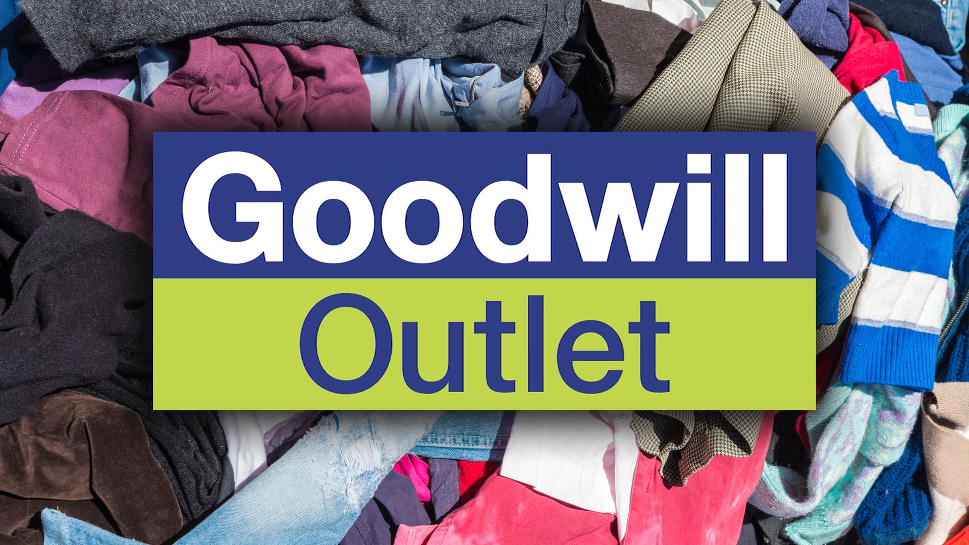pile of clothes with goodwill logo