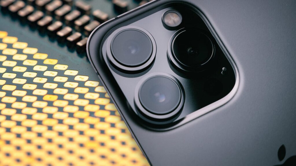iphone 13 on processing chip background