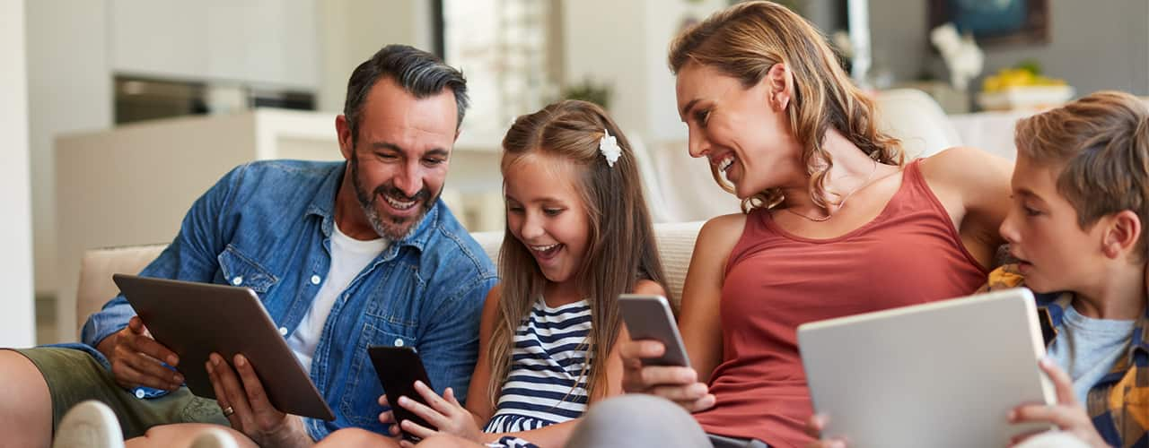 family using cell phones