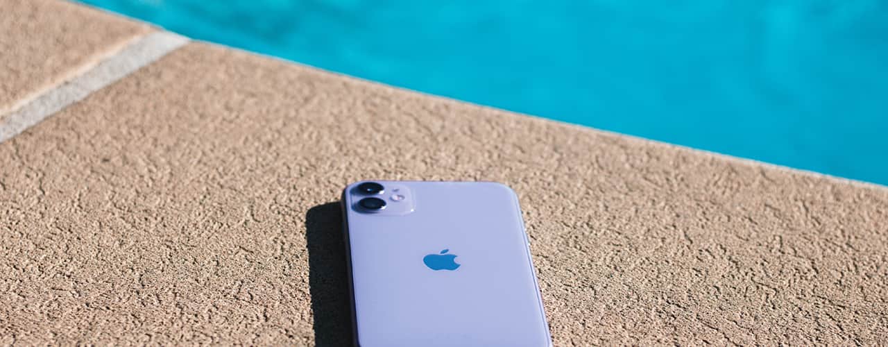 iphone in the sun by the pool