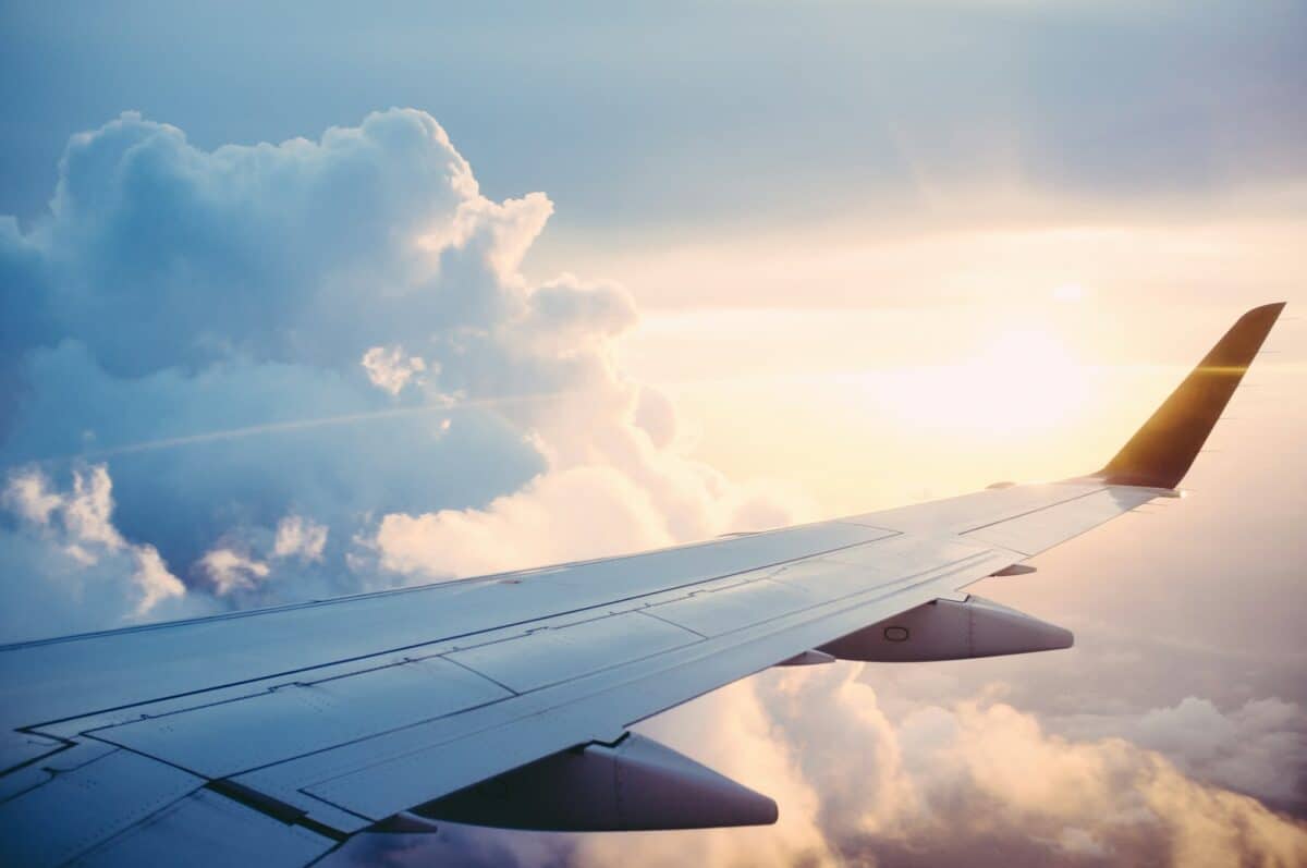 Airplane wing in the clouds