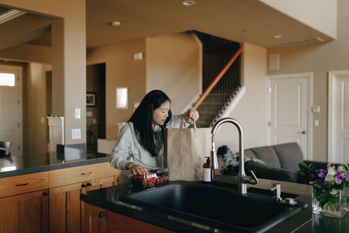 Woman unpacking groceries